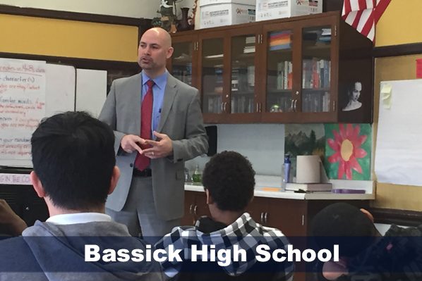 A speaker presenting to students at Bassick High School